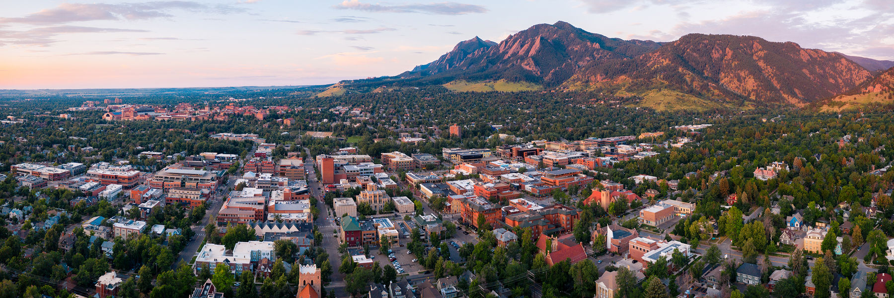 Downtown Boulder Colorado with mountains in the background
